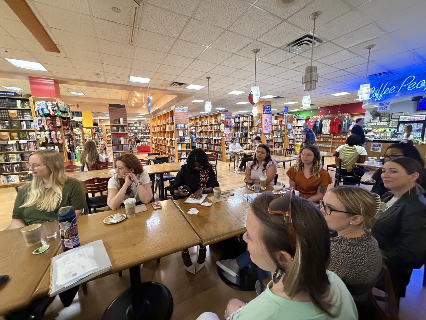 Attendees networking at the Women Communicators of Austin Morning Mingle